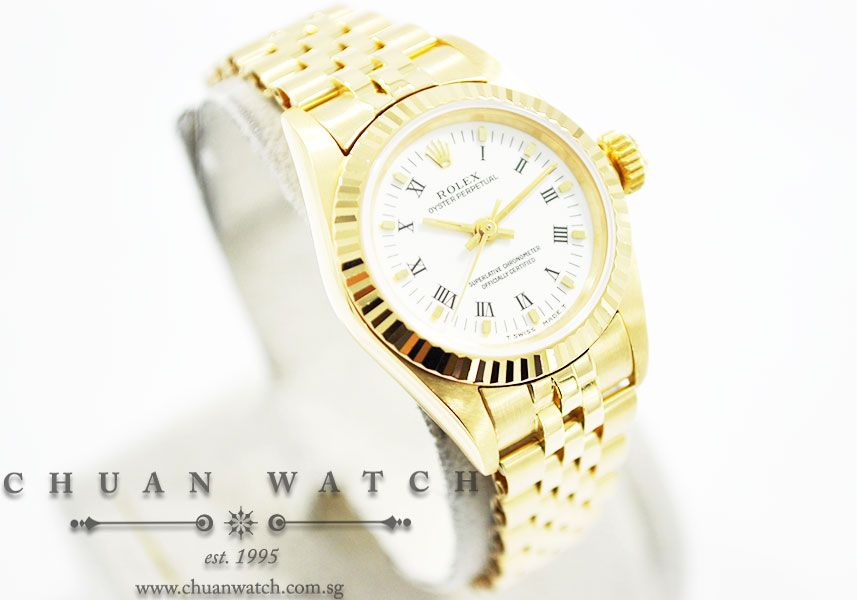 Rolex Ladies Oyster Perpetual No-Date Yellow Gold 26mm 67198 White Roman - Discontinued - Image 3