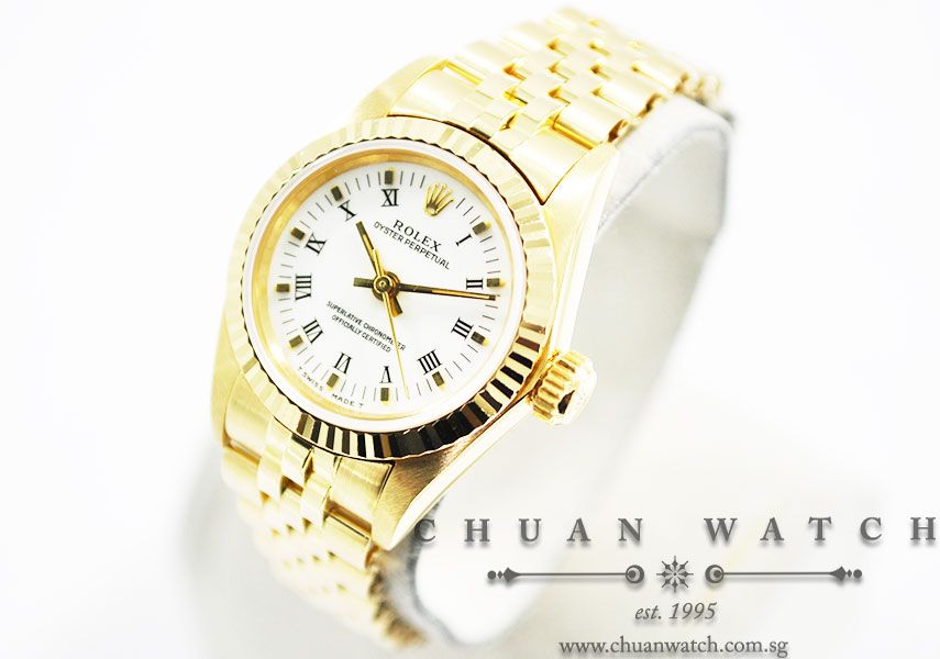 Rolex Ladies Oyster Perpetual No-Date Yellow Gold 26mm 67198 White Roman - Discontinued - Image 2